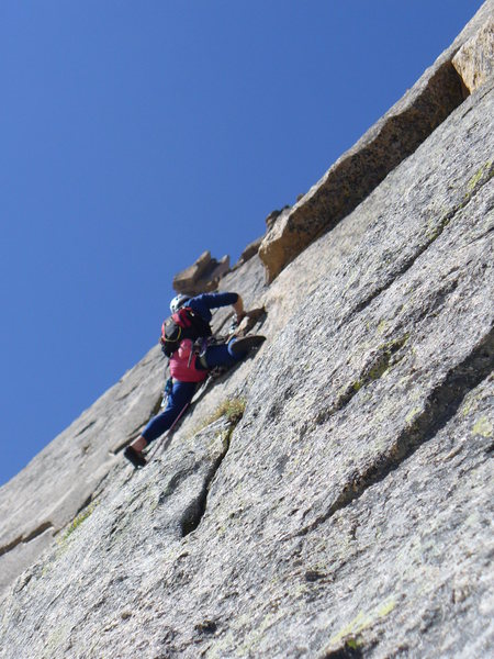 Joe Chorny leading pitch 6 just below A-shaped roof.