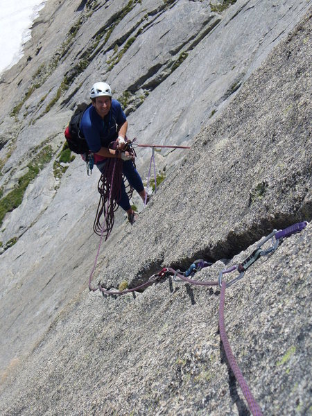 Joe Chorny hanging belay on crux pitch 7.