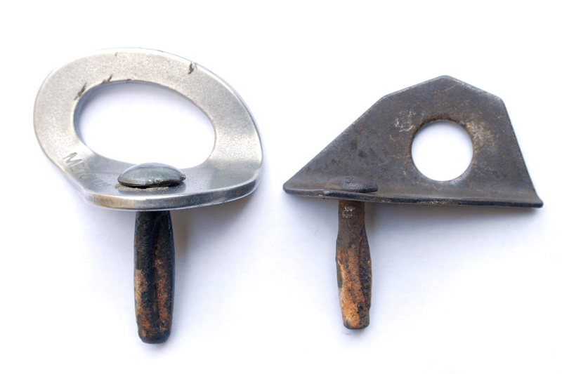 Here is a comparison between the recently-removed 1/4-inch bolt (on the right) and one of the 5/16-inch bolts removed from another wall.