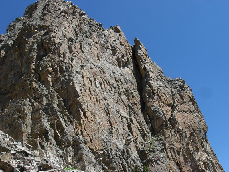 Main portion of Rock Springs Buttress. Exum Arete is the right edge of the huge cleft.