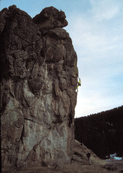 Cam Burns belayed by his father and photographed by his mother during the FA of Roadside Attraction in 1989.