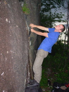 Richard cleaning out the bottom of the crack to the left of the thin Sigourney Weaver Crack.