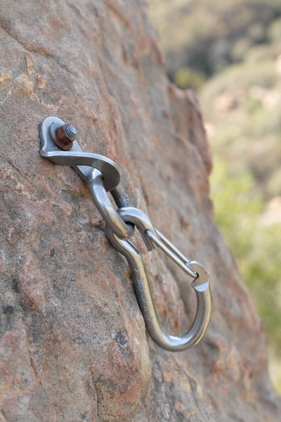 This is an externally-threaded sleeve bolt at Fire Crag with a Fixe Sport Climbing Anchor attached to it. It is the ONLY anchor bolt that protects an easy climb on one side of the crag. Apparently people are clipping a rope through the hook and using the bolt as the sole protection for this route.
