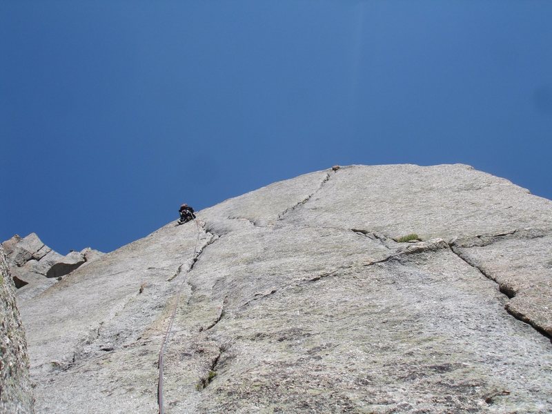 Jonny climbing the 5.8 variation to South Buttress. Photo by Gigette