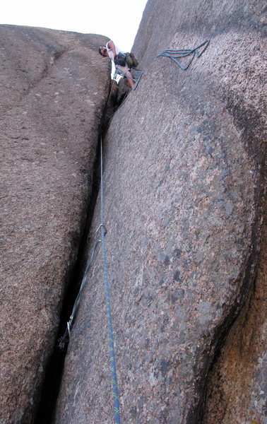 We screwed up and belayed just after the crux of p2 for our first belay. Not the best idea cause you have to extend the #5 out a lot. While leading he was looking at decking on the first belay station. Adam mostly liebacked the crack until after it pinched then got in it like an OW, which didn't make placing gear friendly. A note for the second, not fun with a pack, can't get in as much as you want.