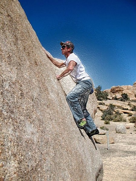 James climbing the Hensel Face (V0) on a really hot day, Joshua Tree NP