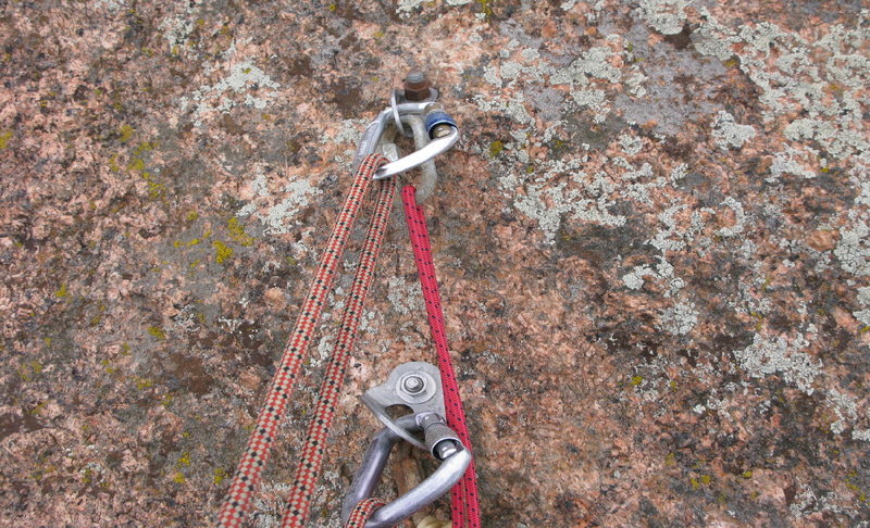 The bolts for the rap on the north summit. 1 SMC hanger, 1 ASCA hanger, good studs.