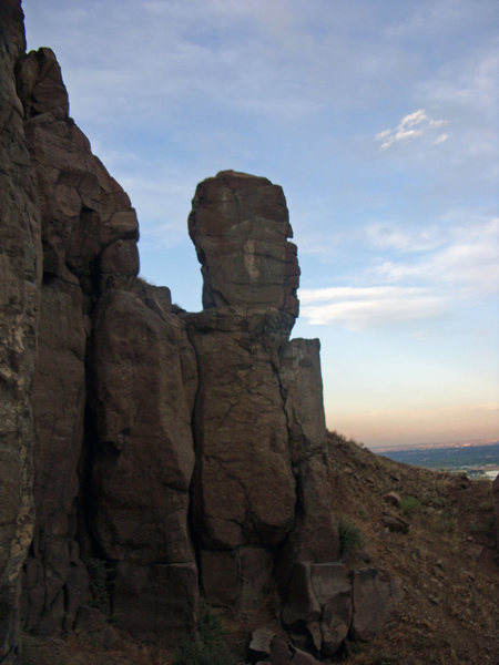 We climbed the short offwidth just to the left of the mummy head. It felt about 5.9.