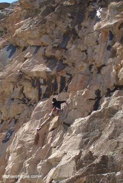 Climber on a wet Carlin in April.