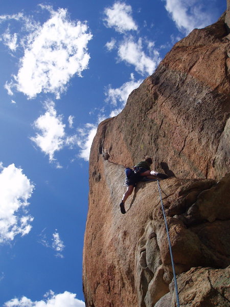Crack climbing at Split Rock. The .12a bolted black streak is just to the right.<br>
Photo by Tara Reed