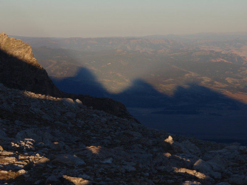 The Shadow of the Grand and the Middle Teton as seen during the sunset from the lower saddle