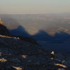 The Shadow of the Grand and the Middle Teton as seen during the sunset from the lower saddle
