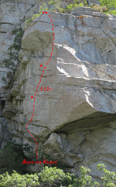 The Duomo wall with the route "Above the Hearth" drawn in. The red circles are bolts. The P is a fixed knifeblade.