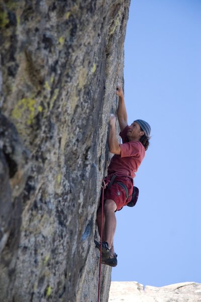 Working hard on the steep finishing wall of Goldilocks, 5.11a