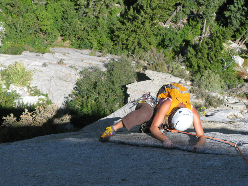 Maura happy to be above the "House of Cards" on pitch 3 of that route.