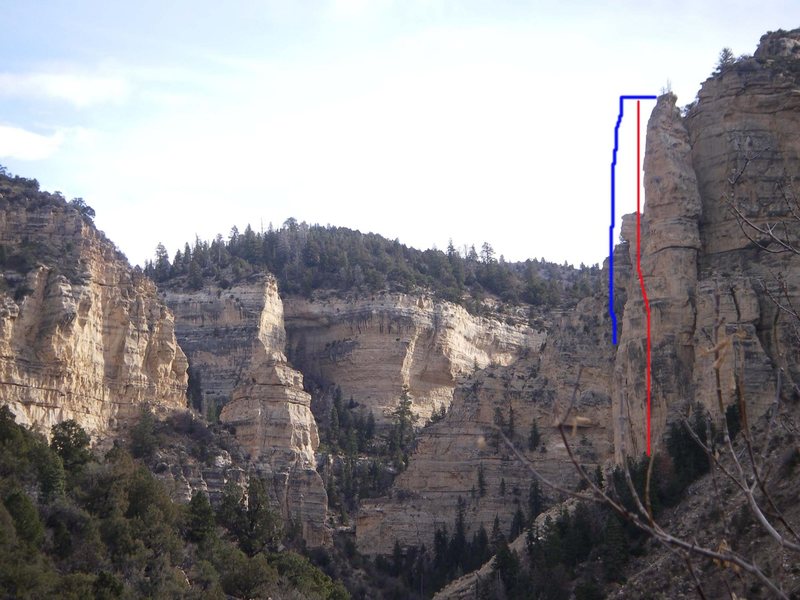 The blue line indicates what the tower used look like. The red line is the line of 1st ascent on the tower.