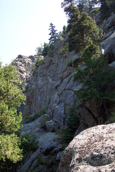 View of the main wall from the top of the approach gully/ramp.