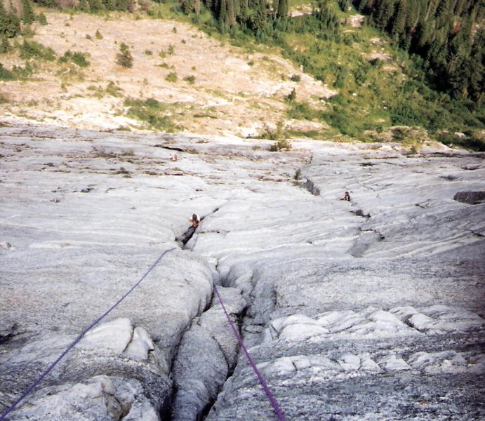 Belaying both girls up same time middle pitches.<br>
Directly below Rox in the white shirt are two guys that made a big deal about taking my daughters on the route.<br>
We were ready to climb first and started climbing. By having the girls climb staggered but at the same time the guys never got with in three pitches of us.