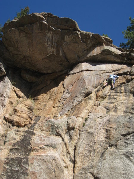 Katrina is about to leave the finger crack and tackle the crux.