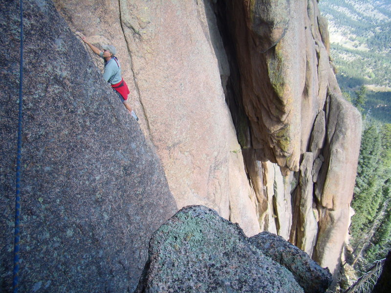 Mike traversing over to the start of a central crack system we were aiming for in the South Platte. A VFA, direct and up the center of the main buttress. 5.10- R