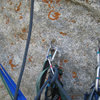 The hanging belay at the top of pitch 3. Two older bolts and one new one.