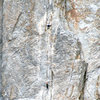 Matthew Fienup using all of his 34-inch inseam, on P2 (make that P4!) of the Central Pillar. Photo by Linda Patterson.