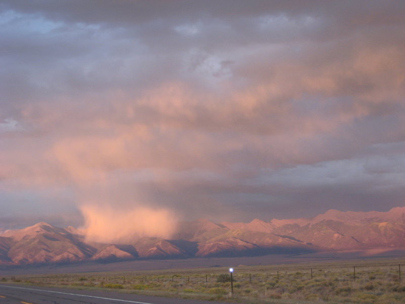 Evening t-storm spattering the Sangre de Cristos in the San Luis Valley.