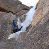 Chris Sheridan coming to grips with the idea of bailing. The ice from this point up was just less than vertical, about four inches think, and totally detached.  Easy but dangerous, just like Russian Roulette.<br>
<br>
Photo by Andy Grauch, 9-28-08.