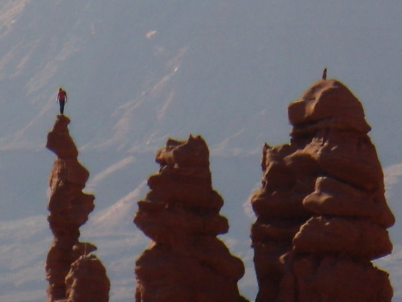 Climber on the summit of Ancient Art March 2008.