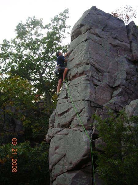Jon climbs the upper moves of King's Throne on lead.