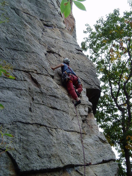 Stepping up to the stance below the crux.