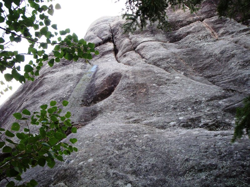 "Love Above" climbs the bolted face into the splitter crack left of center in the photo.