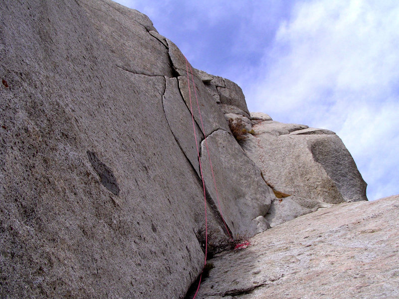 The Flakes. <br>
The route goes right at the first V and is a perfect handcrack up to the second V.<br>
After that undercling lieback to the wide section, then more of the same to the top.