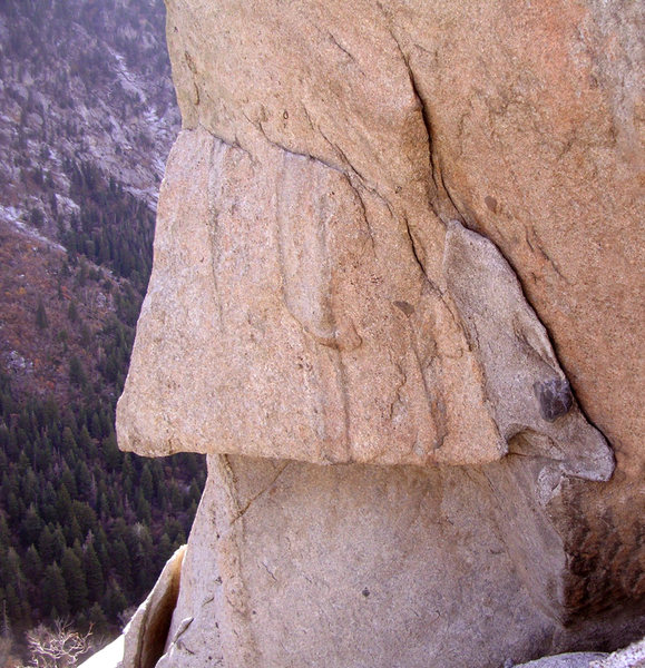 The bolted traverse to the arete. Good holds but intimidating.
