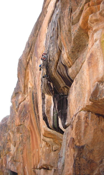 Dave Russell drilling on the first ascent.