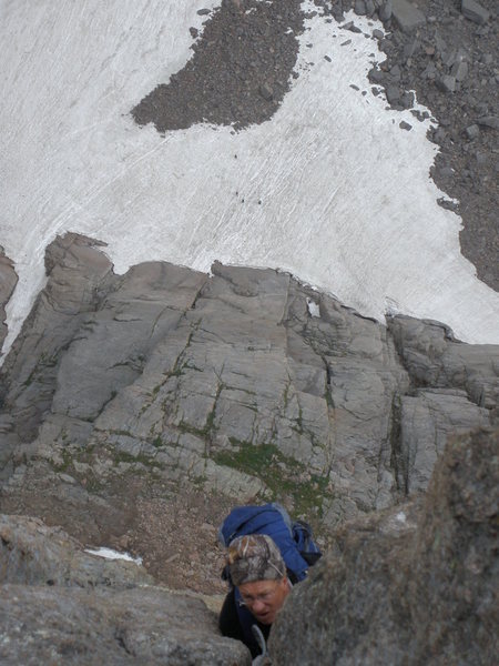 Douglas following the last vertical pitch on the casual route! Climbers down below on the snow!