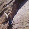 Chris Sharma enjoys a rare trad lead on the first pitch of Center Route, June 2008.
