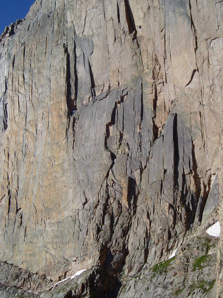 As seen from high on Directissima.<br>
The route climbs a crack at the center of the photo up to the right side of the curving gray slab. Then way left to the left of the two right facing corners. A crack above that leads to Table Ledge at the top left of the photo.