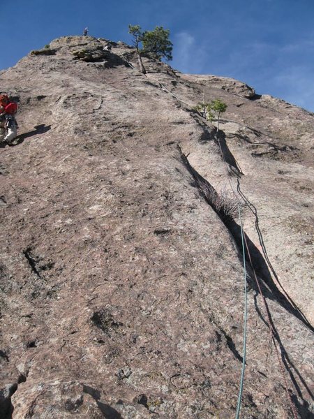 Easier P2 line up the crack, even easier climbing further right.