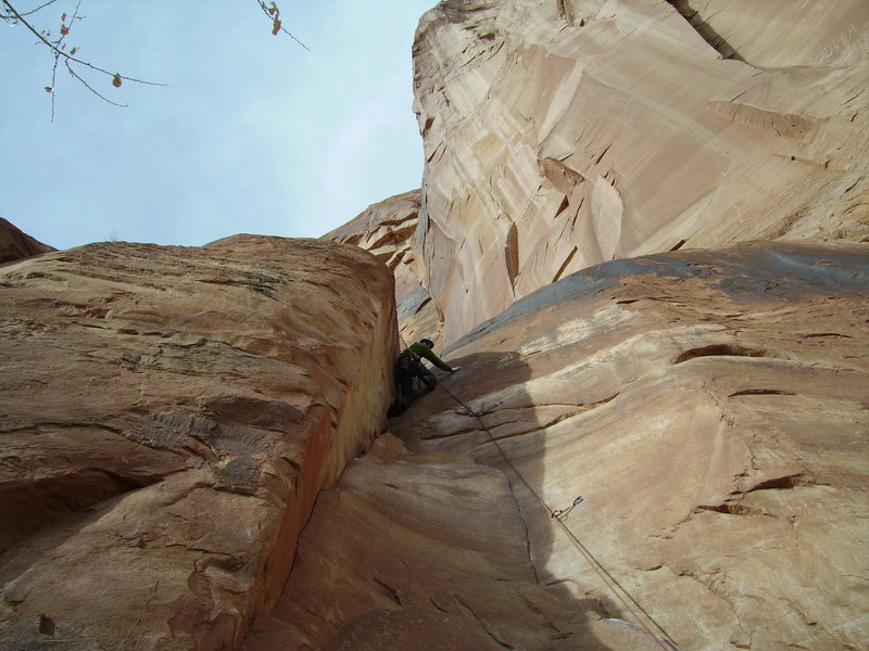 Pushing through the crux above the last bolt (3 of 3 on the route).