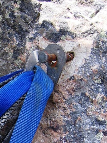 Anchor bolt on Glass Ocean in Big Cottonwood Canyon. Fixe stainless hanger and grade 5 Rawl/Powerbolt.