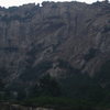 A completely unclimbed wall 100m down the road from Lao Yan Chang, just waiting for your FA. The wall looks to be 300ft+.
