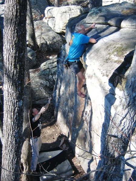 Calvin Landrus climbing w/ Brad Killough spotting him. CMC 08
