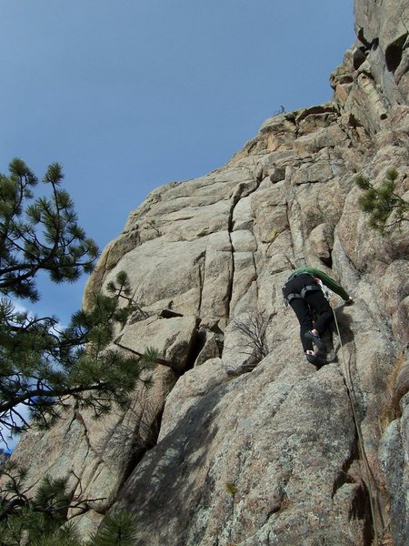 Bert leading South Slabs, which starts in the short finger crack to the left.