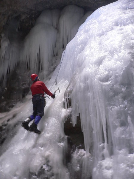 Eric Simons in action on the left route. This guy was doing FA's on WI4 M3 routes back east in the early '70s, how about you?