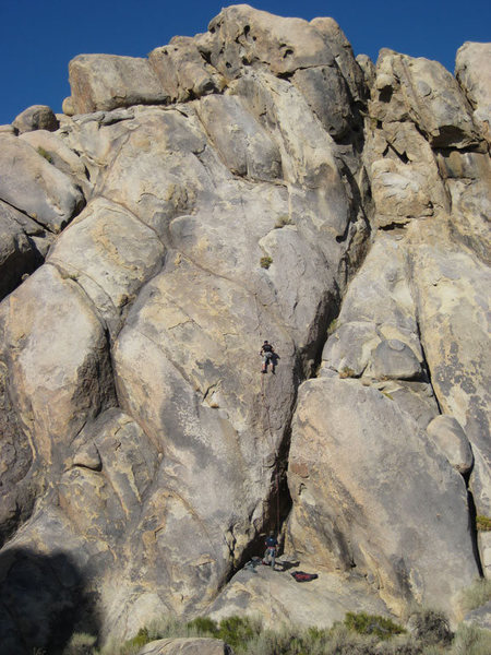 Rock Poedtke leads Lives of the Cowboys (5.9) in the Tall Wall area. This two-pitch route, established in 2008, is to the left of Rotten Bananas. Photo by E. Holland.
