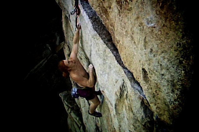 Luke polishes of the final crux move on the Traps classic "The Sting". The Gunks. New Paltz, NY.