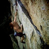 Luke polishes of the final crux move on the Traps classic "The Sting".  The Gunks.  New Paltz, NY.