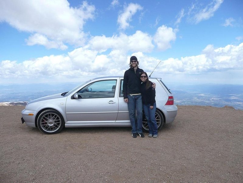 Lynn and me with the GTI after flying up the twisties at Pike's Peak.