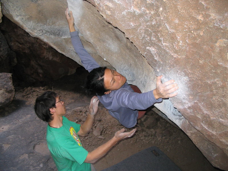 Linda moving from the steep jugs out onto the face. This is where the problem changes character from roof with pinches to slopy crimps and such.
